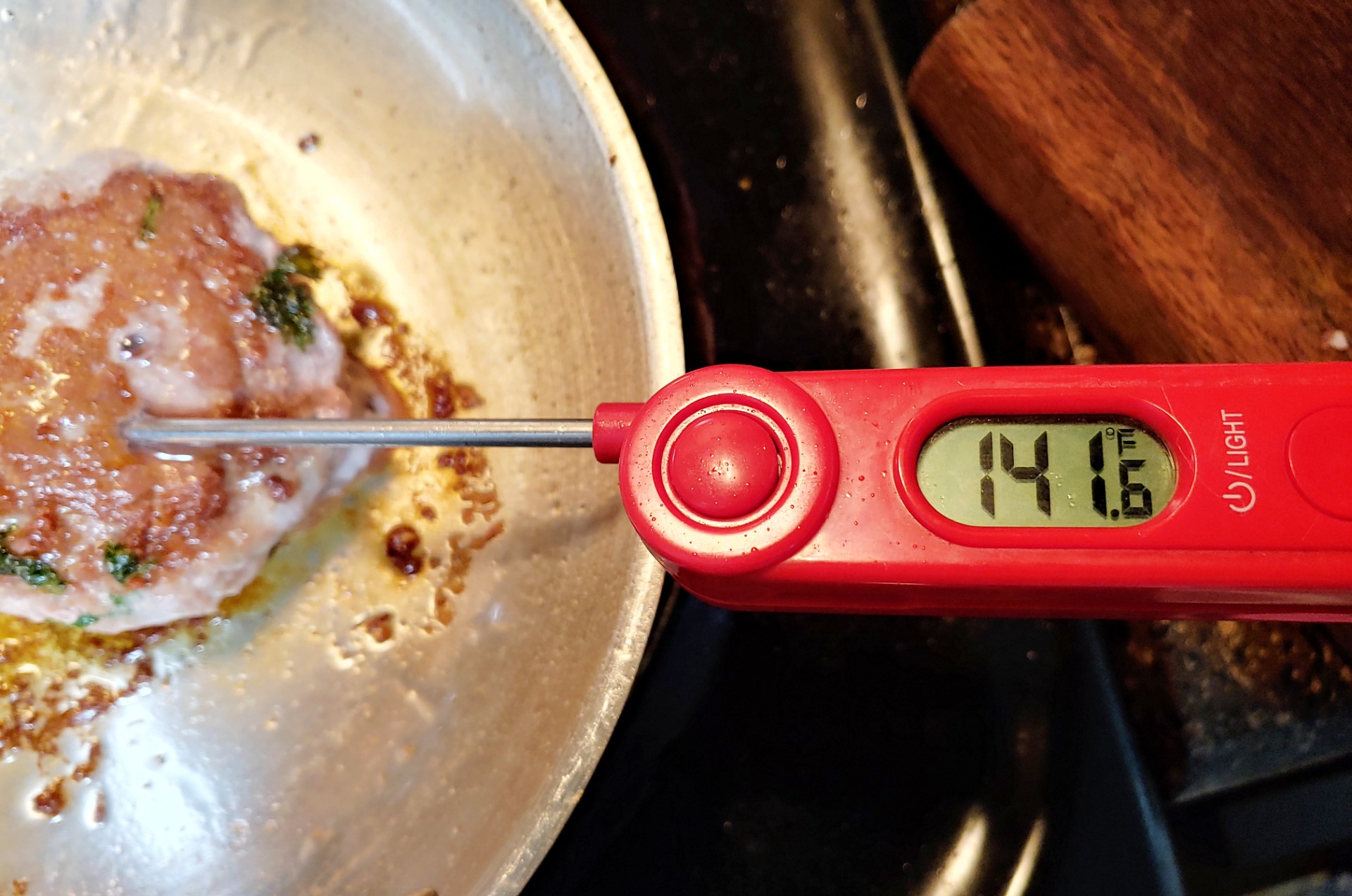 meat thermometer being used for turkey burgers