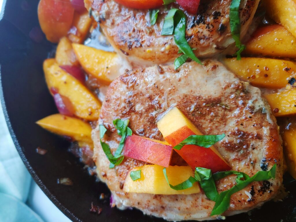 whole 30 peaches and pork chops with basil in skillet