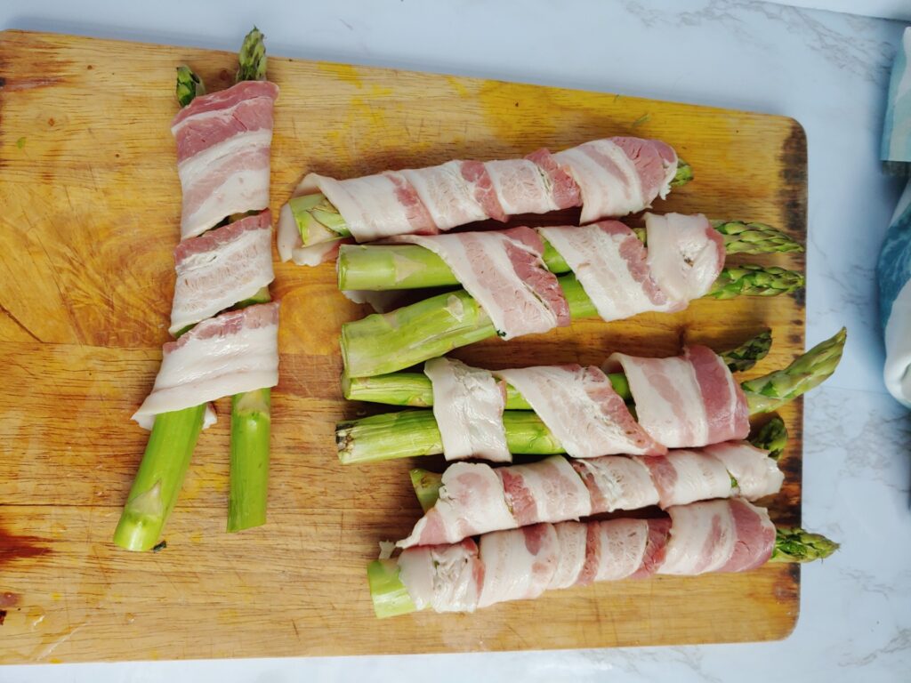 Raw bacon wrapped asparagus