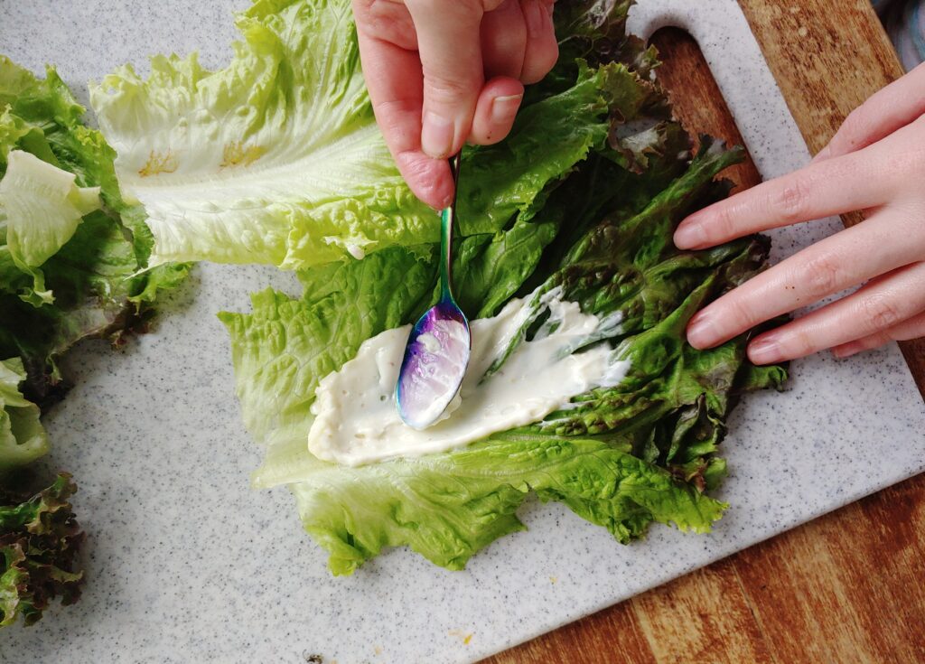 smear lettuce with dressings