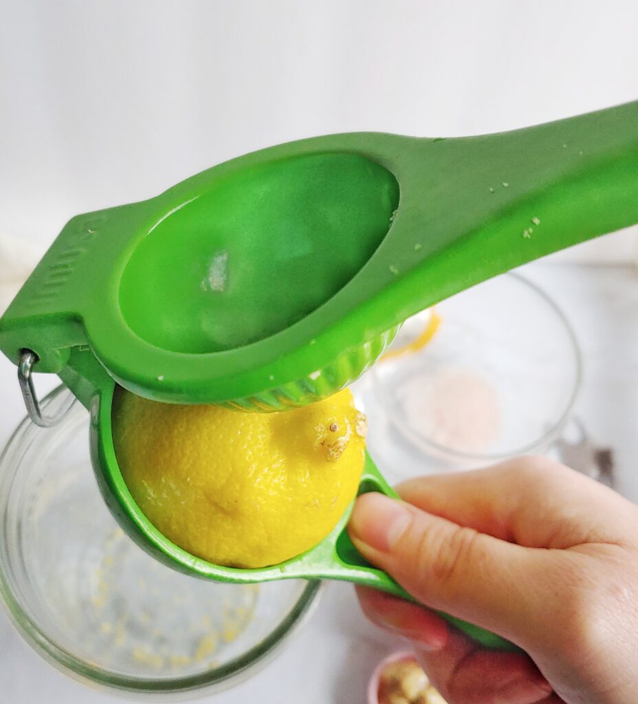 squeeze the juice of half a lemon into the jar