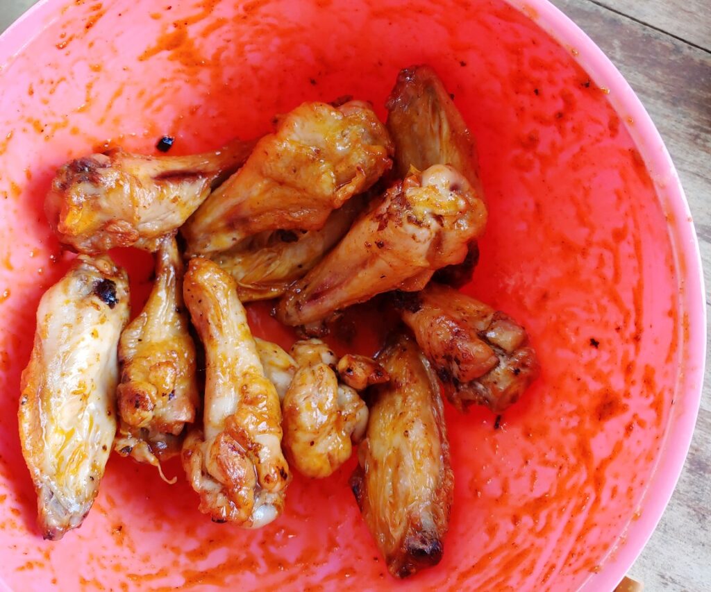 toss air fried chicken wings in whole 30 buffalo sauce
