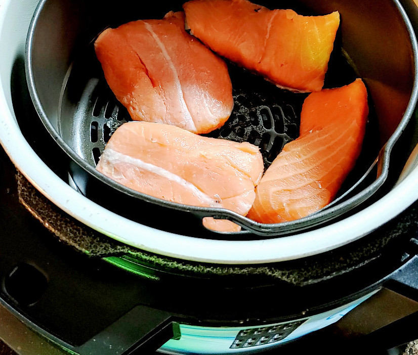 raw salmon in the ninja foodi spaced apart